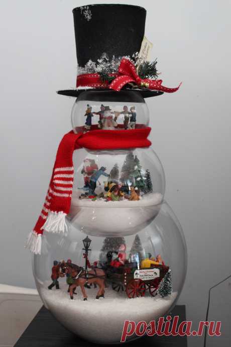 loving my latest Christmas craft. Glass Fishbowl snowman with frosty hat filled with lemax figurines Fish bowl glass tree snow