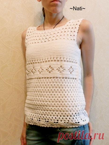 Белая жилетка крючком. 
Состав: 100% хлопок
Пряжа: &quot;Alize bella&quot;
Познакомится подробнее с моим творчеством можно в моей группе: https://vk.com/vazanie_ot_nati Другие фото этого топа по ссылке