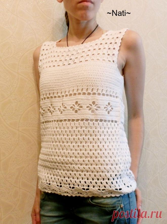 Белая жилетка крючком. 
Состав: 100% хлопок
Пряжа: "Alize bella"
Познакомится подробнее с моим творчеством можно в моей группе: http://vk.com/vazanie_ot_nati Другие фото этого топа по ссылке