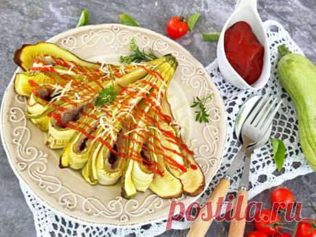 Веер из кабачков с фаршем в духовке Веер из кабачков с фаршем в духовке - это аппетитное и сытное блюдо, которое станет отличным обедом или ужином. Кабачки, запеченные с мясной начинкой, выглядят как красивый веер, напоминающий цветок.