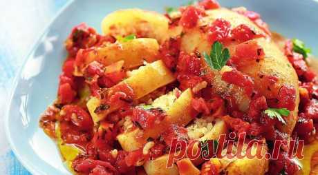 Вкуснятина… Фаршированные кальмары 
=ИНГРЕДИЕНТЫ 
4 тушки кальмара 1,5 стакана вареного риса 3 тонких ломтика бекона 300 г консервированных рубленых помидоров 1 средняя луковица 1 перец чили 2 зубчика чеснока пучок петрушки 2 ст. л. сливочного масла 125 мл сухого белого вина оливковое масло свежемолотый черный перец соль