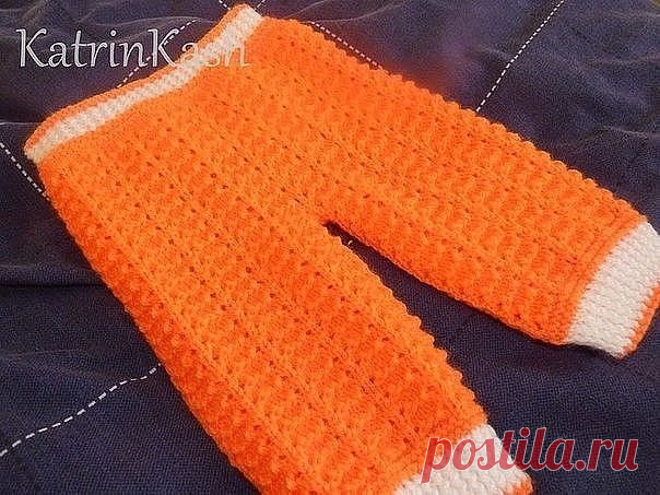Детские штаны, связанные спицами