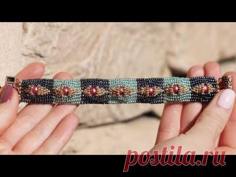 Браслет из бисера и бусин &quot;Око дракона&quot;  ᅳ это стильное украшение, которое добавит изюминку вашему образу.
С этим аксессуаром вы сможете создать образ с нотками востока в считанные минуты!
Как можно носить браслет из бисера?
Этот аксессуар может стать отличным дополнением к вашему образу как для вечеринки, так и для повседневной жизни.
Браслет из бусин и бисера "Око дракона" ᅳ модный акцент, который подарит вам массу положительных эмоций.
Украшения из бисера ᅳ популярное направление …