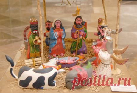 Oaxaca Nativity Scene Close-up of a carved wood nacimiento from Oaxaca, Mexico. This was an entry into a nativity scene contest held in the City of Oaxaca, Mexico.The white tag at lower right gives information about the maker of these pieces, but I can't make it out