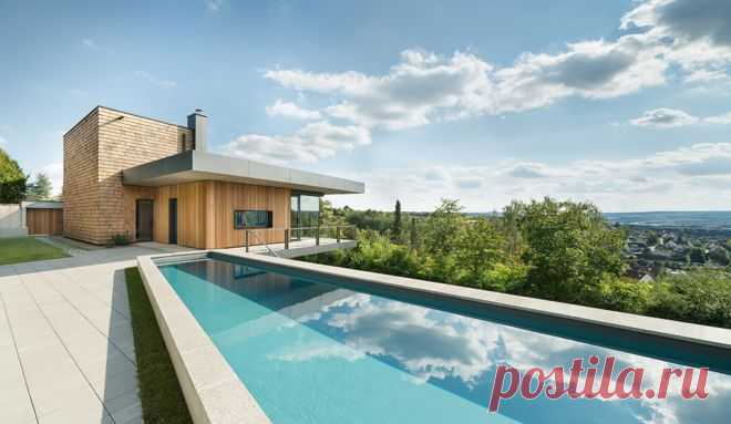 Houzz Германия: Дом с бассейном на склоне холма