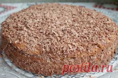 Продукты:2яйца,1банка сгущенки,1ст.муки,100гр маргарина,1ст.л.сахара,1ч.л.соды,погашенной уксусом,для крема:450-500гр сметаны,1ст.сахара,1плитка молочного шоколада-для украшения