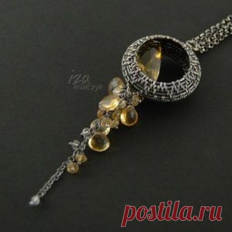 Iza Malczyk Gallery of artisan silver jewellery.