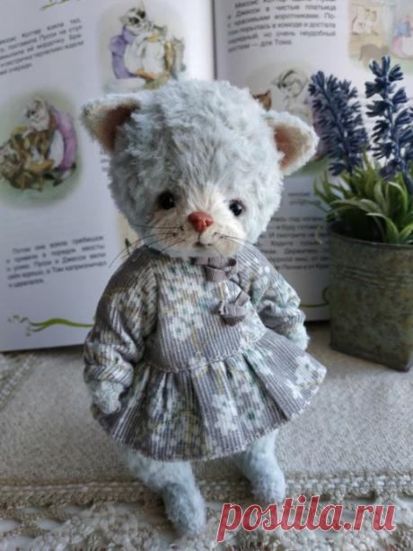 Плюшевая кошечка
