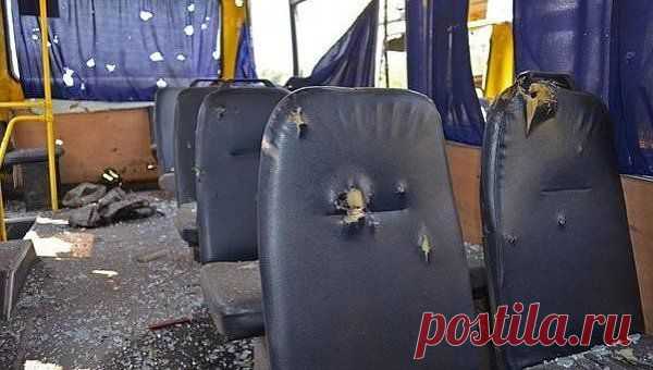 Обстрел автобуса под Волновахой на Донбассе (фото, видео 18+)