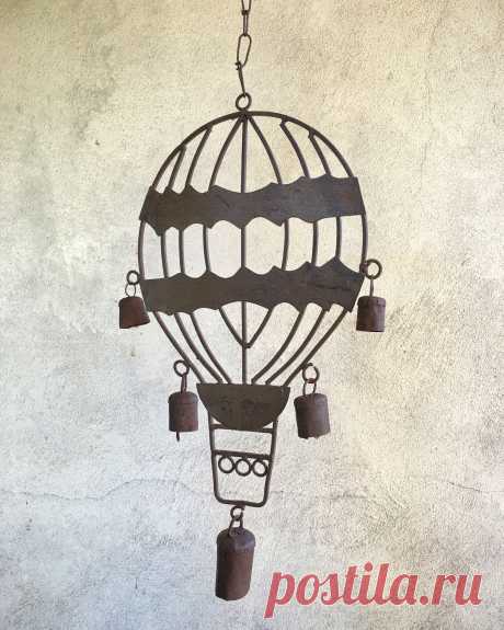 Vintage rustic metal hot air balloon wind chime, old rusty weathered balloon windchime, patio porch cabin decor, primitive cowbell windchime