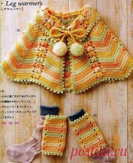 Яркое пончо для малышки крючком.