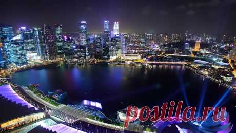 Valeri Denisov
Альбом: СТРАНЫ И ГОРОДА.
Ночной Сингапур.==== Город Сингапур (Singapore City) – столица островного государства Сингапур и по совместительству процветающий деловой и финансовый центр Юго-Восточной Азии. Находится на острове Сингапур. Здесь проживает большая часть населения страны ===В архитектуре Сингапура смешались, казалось бы, несоединимые эпохи и стили. Старая часть города – это кусочек викторианской Англии, чьей колонией ранее был Сингапур. Совсем рядо