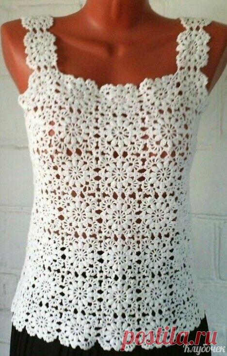 ​Красивый белый топ Красивый белый топКрасивый белый топ составлен из мотивов.И эти мотивы настолько красивые, что вы захотите использовать их и в других вещах.