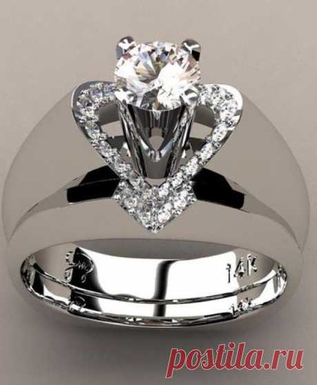 Кольцо. Женское кольцо. Бесцветные бриллианты. Белое золото.