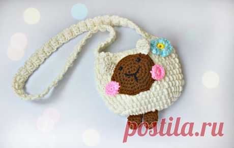 Сумочка крючком - овечка (часть 1)/Crochet bag (part 1) Здравствуйте всем! В этом видео, я покажу, как связала крючком детскую сумочку - овечку! Идея не моя, но схемы я составила сама, делюсь с Вами! Приятного про...