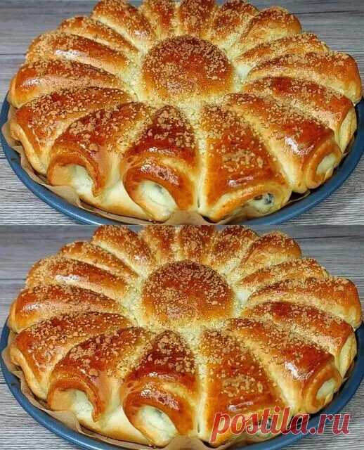 Мягкие и пышные пироги с творожной начинкой
получаются всегда отлично!
Для теста:
- Молоко — 250 мл
- Сметана — 1 ст.л.
- Сахар — 30 г
- Дрожжи — 10 г
- Соль — щепотка
- Яйцо — 1 шт.
- Масло растительное — 100 мл
- Мука — около 500 г

Для начинки:
- Творог — 180 г
- Яйцо — 1 шт.
- Изюм — по вкусу
- Крахмал — 1 ст.л.

Для сахарной посыпки:
- Мука — 3 ст.л.
- Сахар — 2 ст.л.
- Масло сливочное — 50 г

Процесс приготовления:

1. Подготовка ингредиентов:
- Молоко должно быть те...