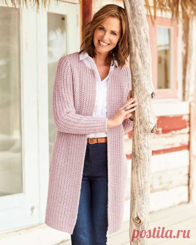 Longline Cable Cardigan A flattering longline layer with striking cable knit to the back, ribbed cuffs and hem. A single hook and eye fastening at the neck and handy pockets makes it the perfect practical weekender. Length approx 33