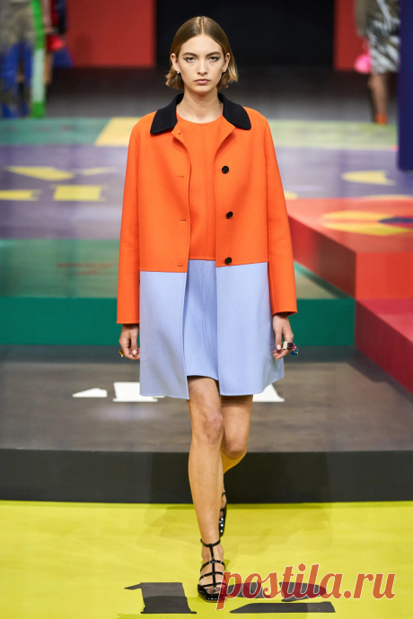 Image may contain Clothing Apparel Coat Human Person Runway and Fashion