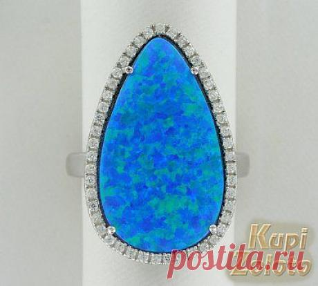 Серебряное кольцо с синтетическим опалом и цирконами - Ювелирный интернет магазин KupiZoloto.com - ювелирные изделия, ювелирные украшения, золотые кольца, золотые серьги, золотые цепи. Доставка.