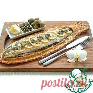 Сибас, запеченный в тесте из морской соли и розмарина.