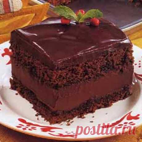 Mocha Layer Cake with Chocolate-Rum Cream Filling This ultra-rich dessert is inspired by the classic Rigó Jancsi cake, named for the legendary Hungarian Gypsy violinist. Make it one day ahead to allow the flavors to meld.