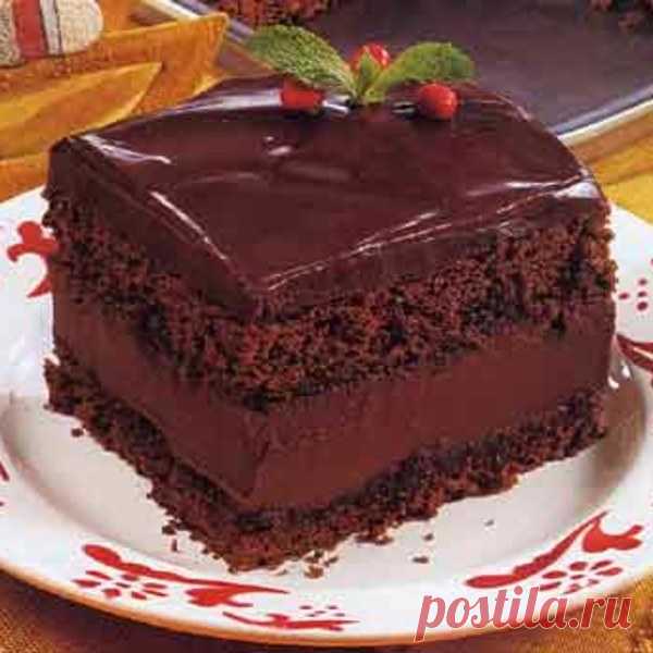 Mocha Layer Cake with Chocolate-Rum Cream Filling This ultra-rich dessert is inspired by the classic Rigó Jancsi cake, named for the legendary Hungarian Gypsy violinist. Make it one day ahead to allow the flavors to meld.