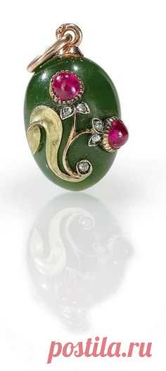 A Jeweled Gold-Mounted Nephrite Egg Pendant By Fabergé, with indistinct workmaster's initials, probably for Michael Perchin, St. Petersburg, 1896-1903 Ovoid, the hardstone body applied with a gold leaf and a flower set with two cabochon rubies and rose-cut diamonds, with gold suspension loop, marked on suspension loop   |  Pinterest: инструмент для поиска и хранения интересных идей
