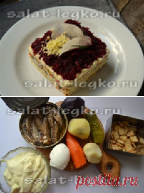 Закусочный салат-торт со шпротами и крекером