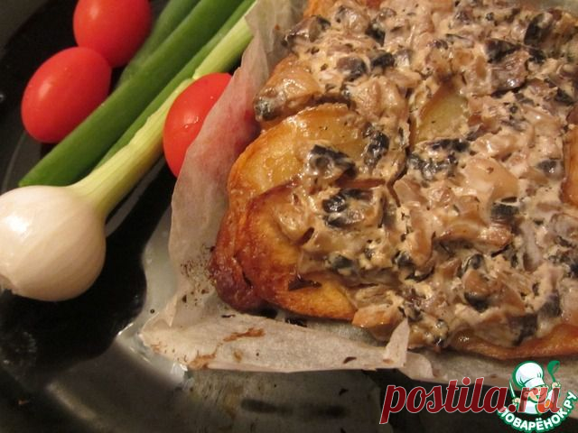 Говядина с картофелем и грибами в сливках, запеченные в пергаменте.