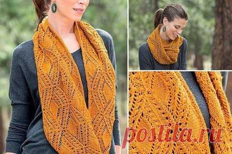 Шарф  с прекрасным ажурным узором в виде сложных ромбов выполнен из яркой пряжи
 
Эта модель добавит изюминку вашему образу
 
Размер шарфа:
 
окружность= 134 см
 
высота(ширина) =27.5 см
 
Плотность вязания: 17 п х 28 р = 10 х 10 см
 
Вам потребуется:
 
411 м пряжи Manos Silk Blend (70% меринос, 30% шелк, 137 м/ 50 г) — 3 мотка,
круговые спицы 5 мм
вязальный маркер или яркая нить
Описание вязания:
 
Снуд вяжется по кругу двусторонним узором.
Набрать 224 п. Соединить вязани...