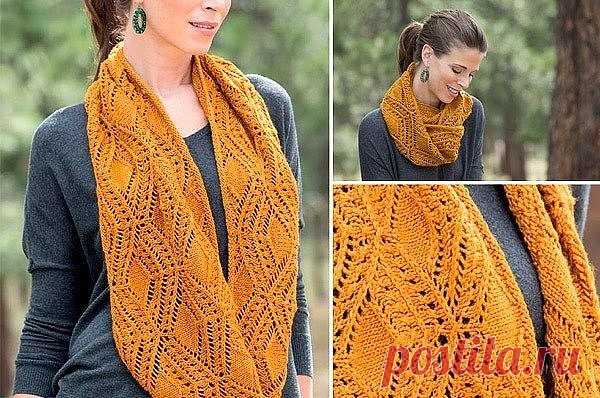 Шарф  с прекрасным ажурным узором в виде сложных ромбов выполнен из яркой пряжи
 
Эта модель добавит изюминку вашему образу
 
Размер шарфа:
 
окружность= 134 см
 
высота(ширина) =27.5 см
 
Плотность вязания: 17 п х 28 р = 10 х 10 см
 
Вам потребуется:
 
411 м пряжи Manos Silk Blend (70% меринос, 30% шелк, 137 м/ 50 г) — 3 мотка,
круговые спицы 5 мм
вязальный маркер или яркая нить
Описание вязания:
 
Снуд вяжется по кругу двусторонним узором.
Набрать 224 п. Соединить вязани...