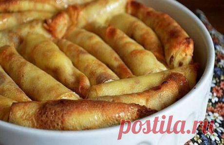 Налистники с творогом я впервые попробовала на свадьбе у друга, которая была в деревне. Их вкус покорил меня навсегда. После свадьбы я раздобыла рецепт этих чудесных налистников, и теперь сама радую свою семью этим чудом. Готовятся они на молоке и крахмале, получается тоненькие, нежнейшие и ароматные, по-домашнему теплые и удивительно вкусные!
Ингредиенты:
Яйца — 5 штук;
молоко — 0,5 литра;
крахмал — 5 столовых ложек;
соль,
сахар по вкусу;
подсолнечное масло — 1 столовая ложка.
Начинка:
Твор