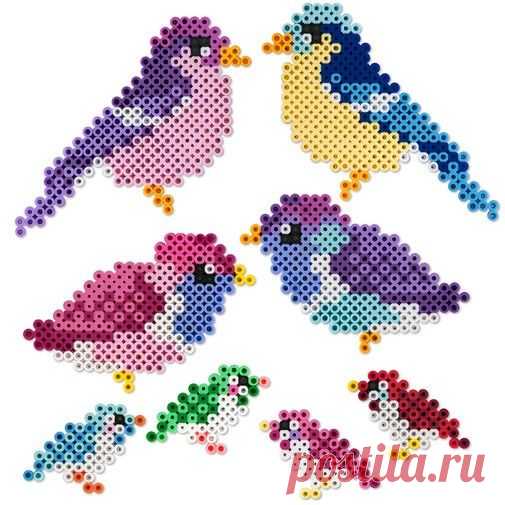 three colorful birds made out of beads on a white background, each with different colors