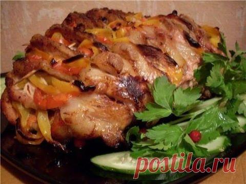 Веер из свинины, начиненный овощами