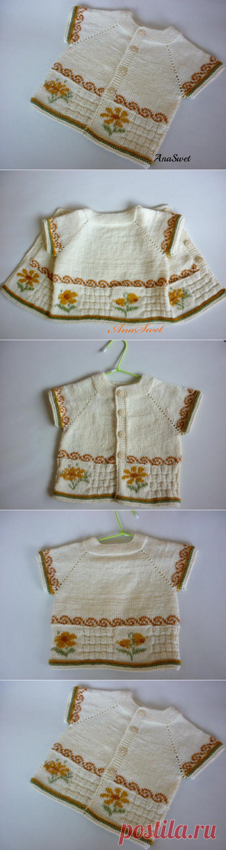 Hand knit baby cardigan whit flowers.