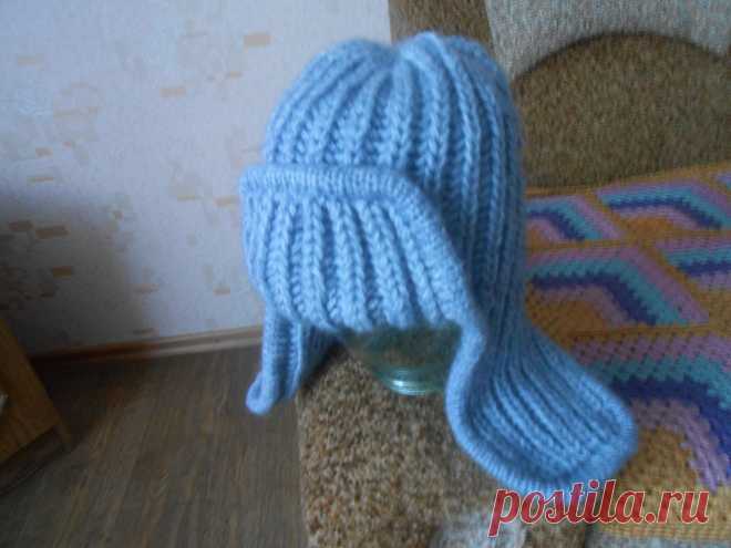 Шапка ушанка | Вязание спицами. Работы пользователей  . Девочки, здравствуйте.Связала на заказ,хочу узнать  во сколько можно оценить мою работу. Пряжа заказчицы. Вязала первый раз, поэтому спрашивала ваших советов. Шапочка теплая в 3 нити. Вроде бы получилось. Вяжется очень быстро, больше времени ушло на кетлевку