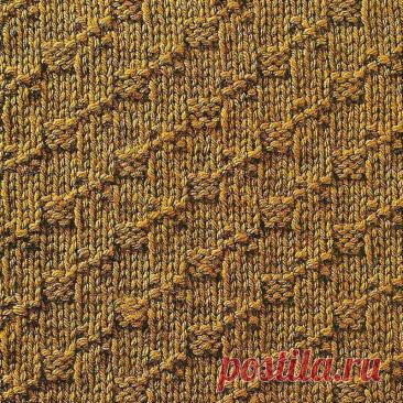 Узор № 83 - рельефный узор в клетку. Схему вязания и условные обозначения вы сможете увидеть на сайте.