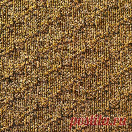 Узор № 83 - рельефный узор в клетку. Схему вязания и условные обозначения вы сможете увидеть на сайте.