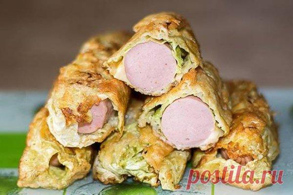 Простые капустные рулетики с сосиской, рецепт — Вкусо.ру