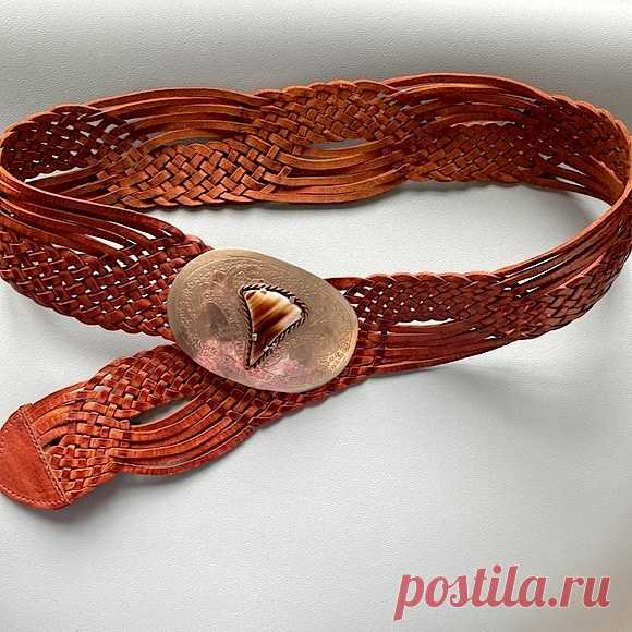 BOHO Belt Braided Woven Leather Silver Buckle Made in Morocco Concho Embossed Shop actuallyvintage's closet or find the perfect look from millions of stylists. Fast shipping and buyer protection. Moroccan, likely vintage, braided leather belt. Silver bucket with embossed design 
and inset stone. 

Woven leather in rich medium tone is in excellent condition. Rather than set holes, the buckle hooks onto anywhere along the braided leather. Can be worn on the hips or tight aro...