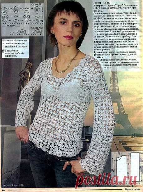 Ажурная белизна Белый ажурный пуловер, связанный крючком..