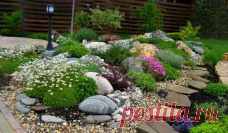 Поделки для украшения сада и огорода своими руками, все новинки 2018, фото оригинальных задумок для дачи Образы для цветников, габионы. Какие камни подойдут для клумбы, ручья, стенки. Образцы деревянного декора. Устройство вертикальных клумб из поддонов. Много фото