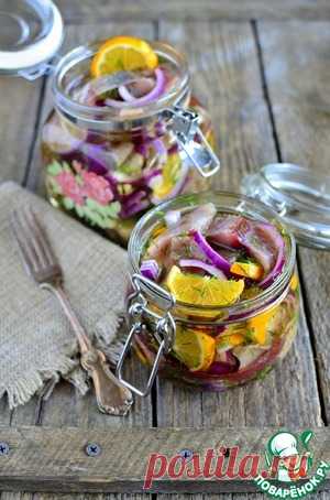 Сельдь с лимонами в масле - кулинарный рецепт