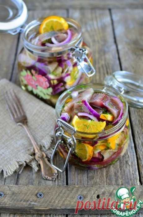 Сельдь с лимонами в масле - кулинарный рецепт