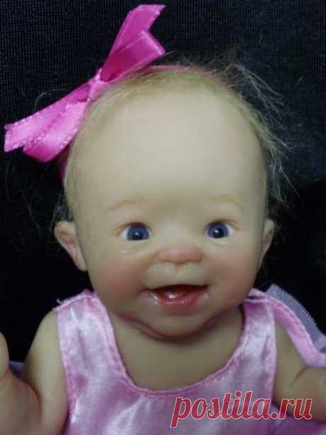 one of a kind polymer clay baby doll by Laura Wambach