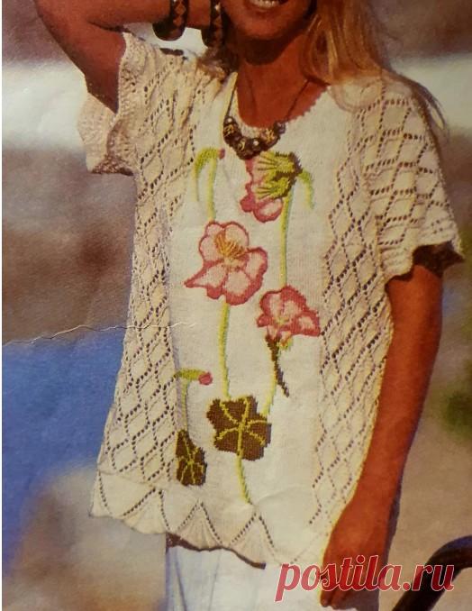 Пуловер с вышивкой