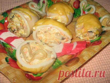 Кальмары фаршированные грибами и сыром. Необычайно вкусно и приготовить не сложно.