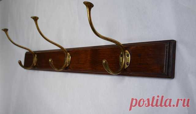 Antique Rack by Adolf Loos Antique coat rack with 3 coat hooks made of brass. The hooks were designed by Adolf Loos for the Cafe Capua in Vienna.