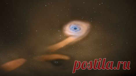 Две сверхмассивные черные дыры разорвали на части звезду | Космос