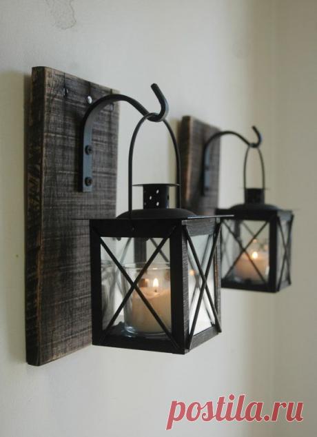 Lantern Pair with wrought iron hooks on recycled wood board for unique wall…